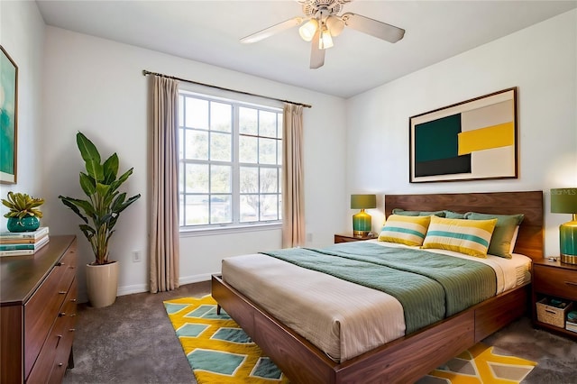 bedroom featuring baseboards, carpet, and ceiling fan