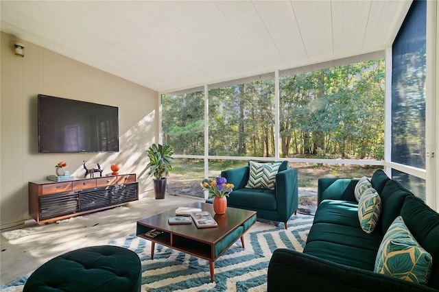 interior space featuring a wall of windows and a wealth of natural light