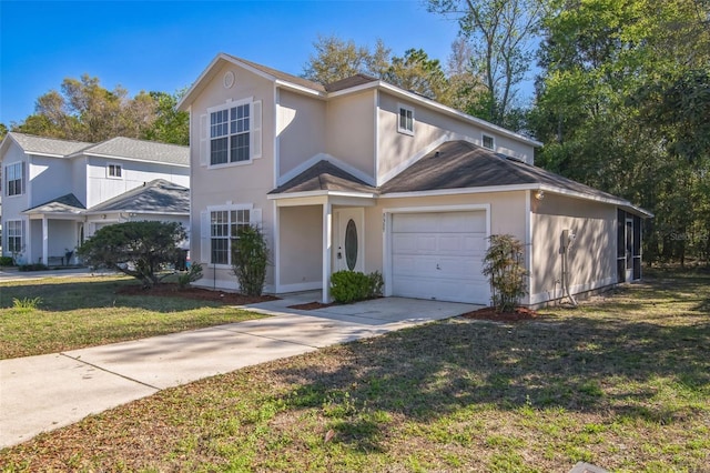 traditional-style house featuring stucco siding, driveway, an attached garage, and a front lawn