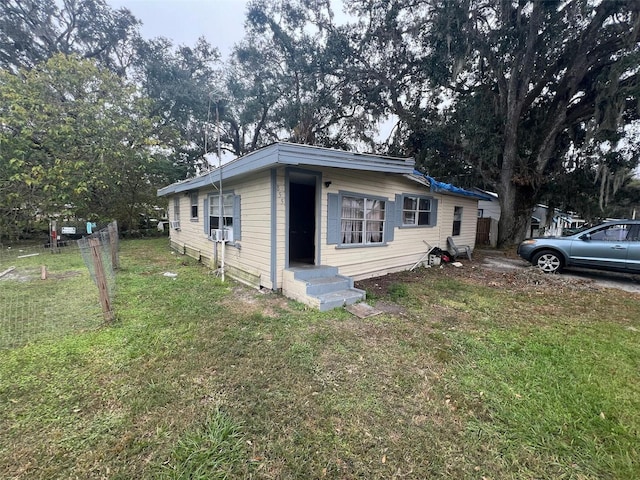 view of front of property with a front lawn