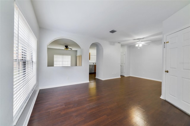 unfurnished room featuring dark hardwood / wood-style flooring