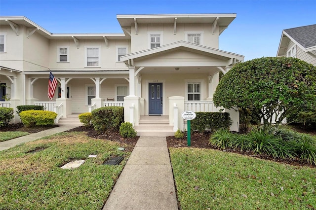 view of front of home featuring a front lawn