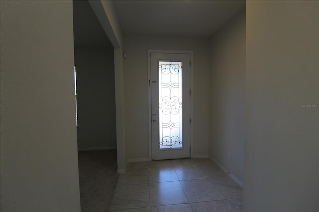 684 Bishop Bay Loop, Apopka, FL 32712 - foyer entrance with baseboards and light tile patterned flooring