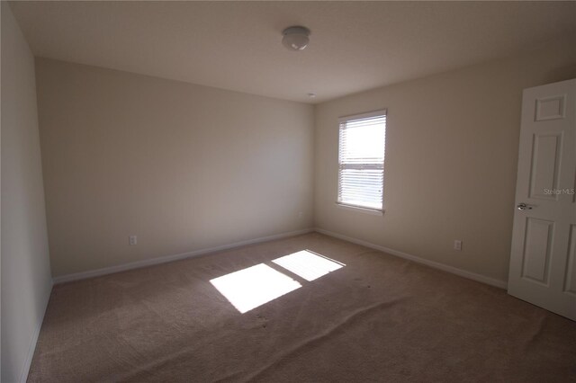 684 Bishop Bay Loop, Apopka, FL 32712 - carpeted spare room with baseboards