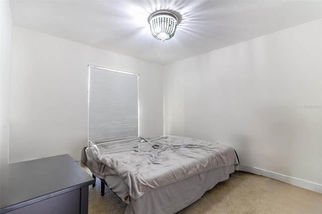 bedroom with light carpet