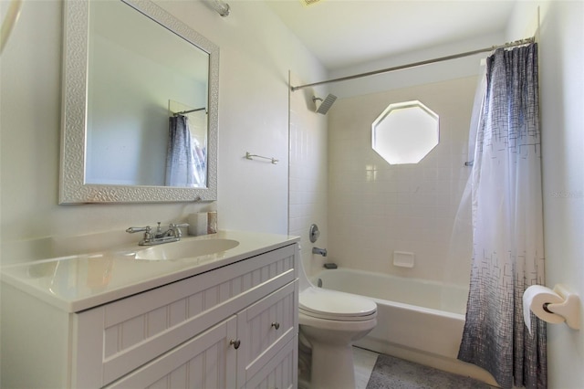 full bathroom with shower / tub combo, vanity, and toilet