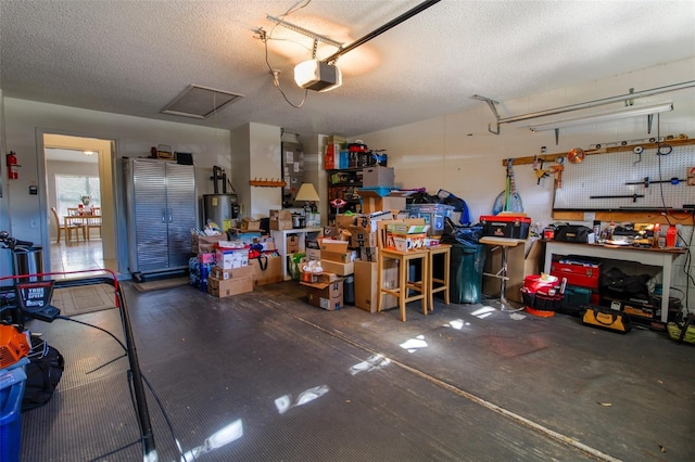 garage featuring a workshop area and a garage door opener