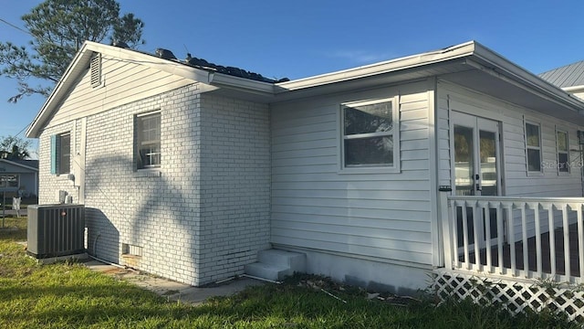 view of property exterior featuring central air condition unit