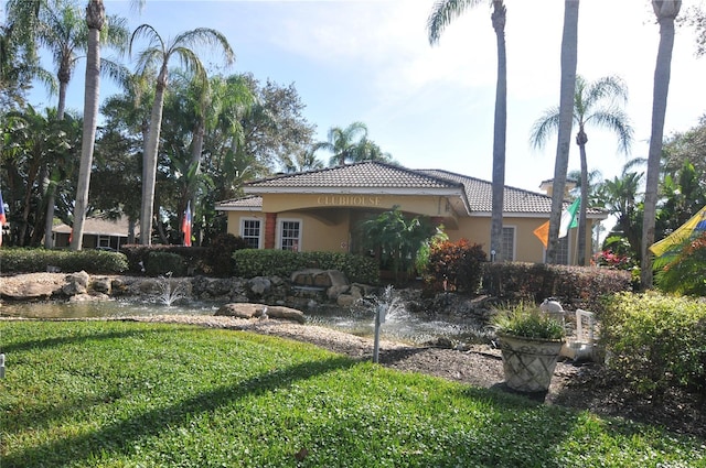 view of property exterior featuring a lawn