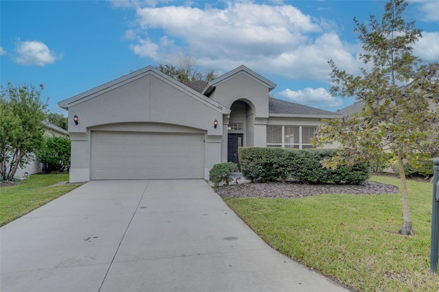 single story home with a garage and a front yard