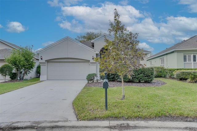 single story home featuring a garage and a front lawn