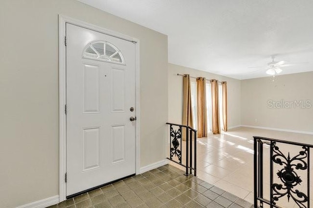 foyer with ceiling fan