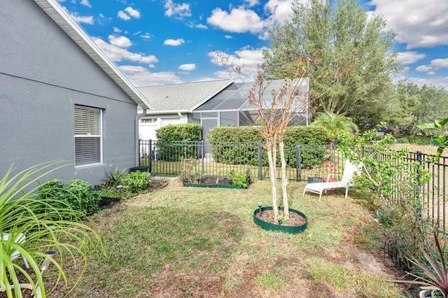 view of yard featuring a lanai