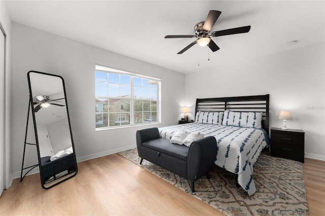 bedroom featuring ceiling fan and light wood-type flooring