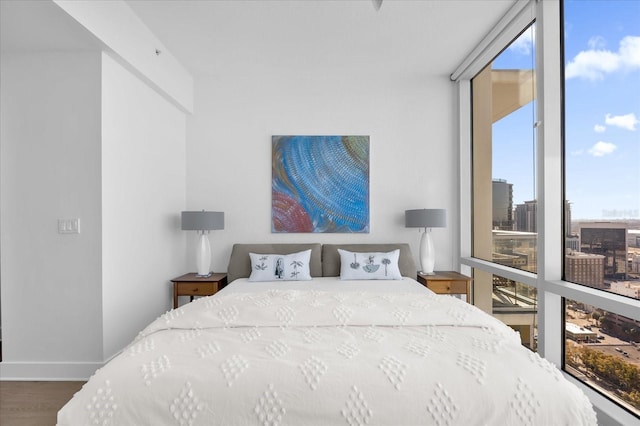 bedroom featuring dark wood-type flooring