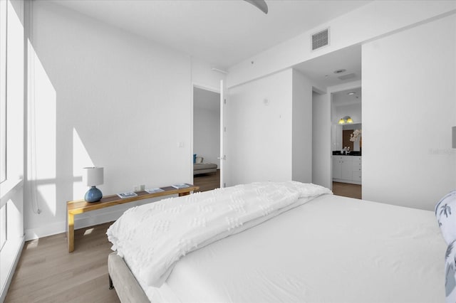 bedroom featuring light hardwood / wood-style flooring