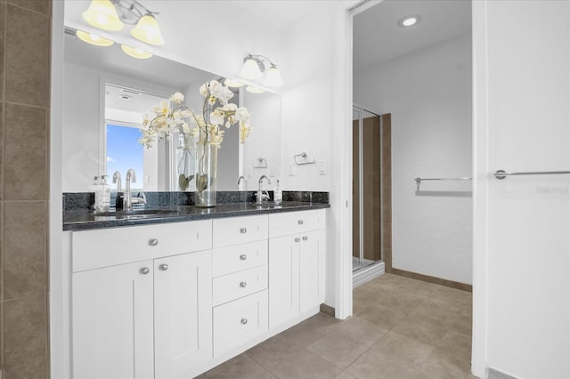 bathroom with vanity and walk in shower