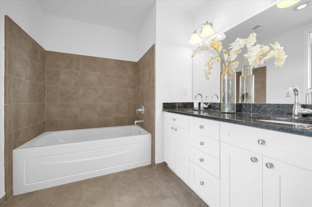 bathroom with tile patterned floors and vanity