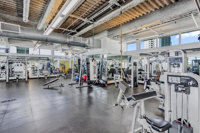 gym with a high ceiling