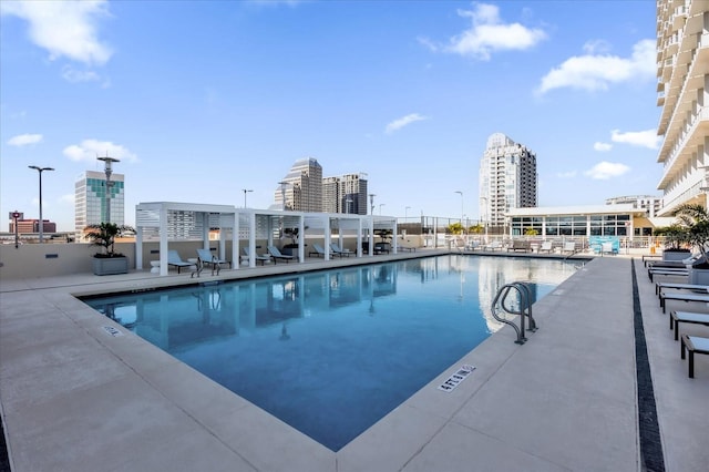 view of pool featuring a patio