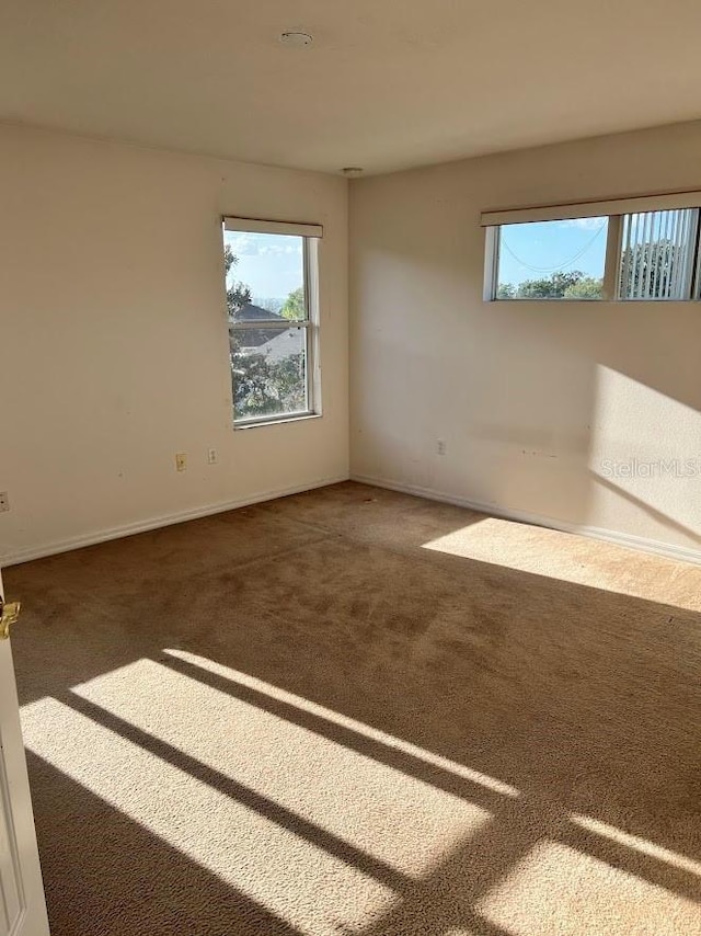 view of carpeted spare room