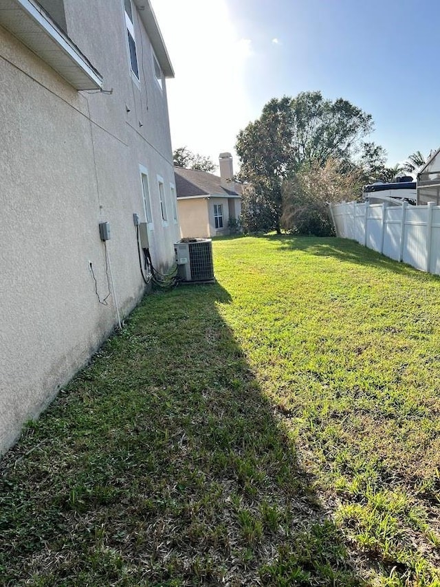 view of yard featuring cooling unit