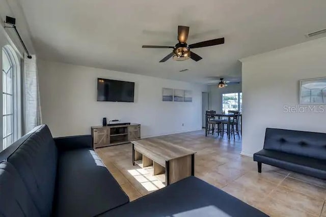 living room featuring ceiling fan