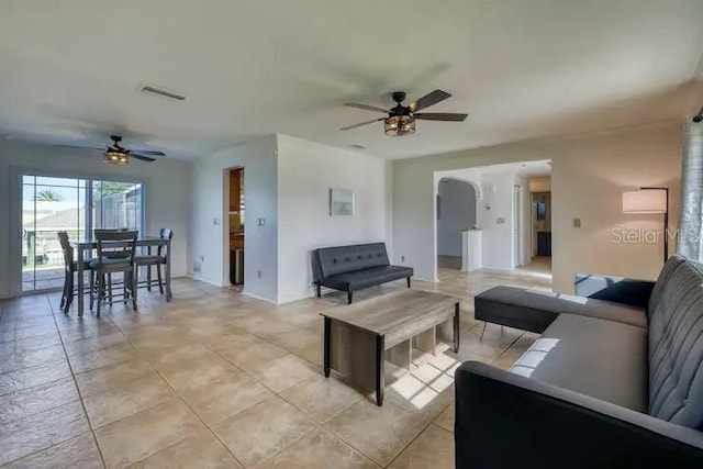 living room with ceiling fan