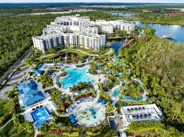 birds eye view of property with a water view