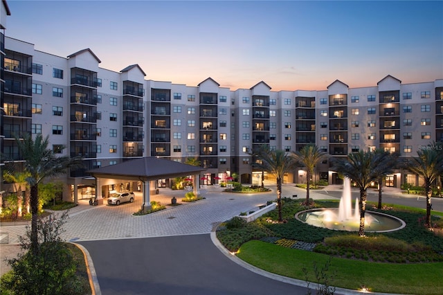 view of property at dusk