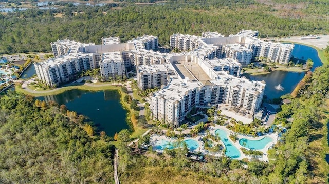 aerial view featuring a view of city and a water view