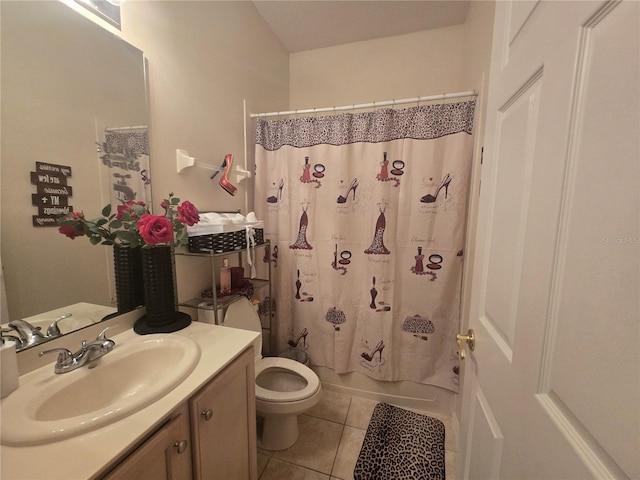 full bathroom with tile patterned flooring, vanity, shower / tub combo, and toilet