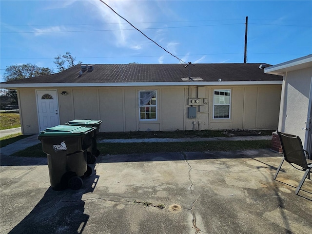 back of property featuring a patio area