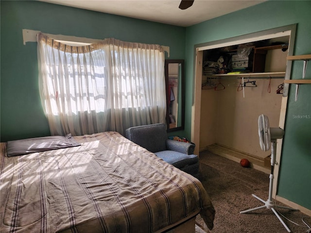 bedroom with carpet floors, a closet, and ceiling fan