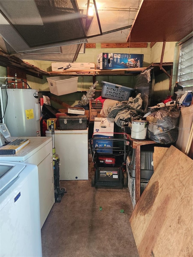 storage area with water heater and washer / dryer