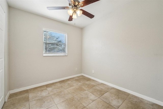 spare room with ceiling fan