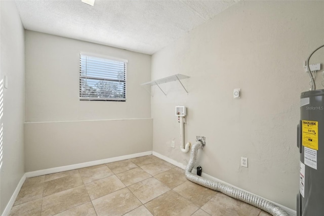 clothes washing area with a textured ceiling, water heater, electric dryer hookup, washer hookup, and light tile patterned floors