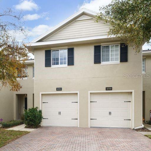 view of front of property featuring a garage