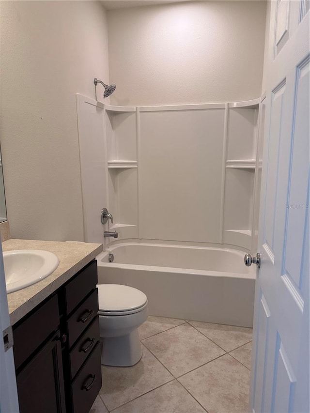 full bathroom with tile patterned floors, vanity, toilet, and tub / shower combination