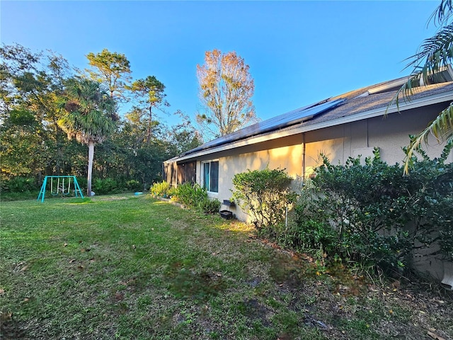 1022 Bartlett Ct, Oviedo, FL 32765 - view of green lawn with a playground