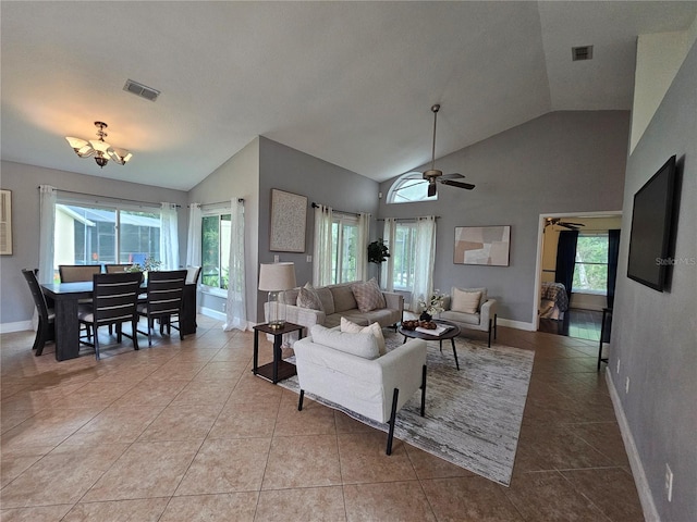 1022 Bartlett Ct, Oviedo, FL 32765 - living room featuring vaulted ceiling, healthy amount of natural light, tile patterned flooring, a chandelier, and ceiling fan