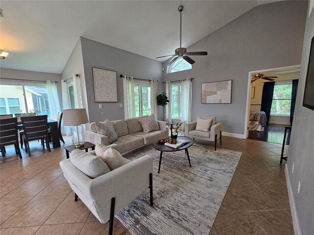 1022 Bartlett Ct, Oviedo, FL 32765 - living room featuring ceiling fan, light tile patterned flooring, and high vaulted ceiling