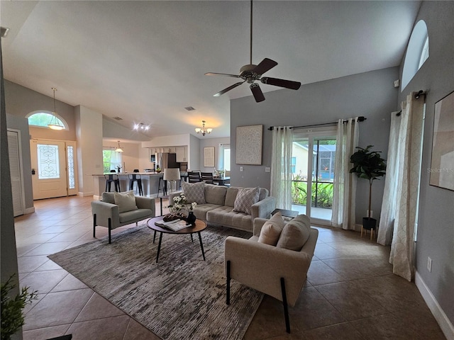 1022 Bartlett Ct, Oviedo, FL 32765 - living area featuring lofted ceiling, tile patterned flooring, and a ceiling fan