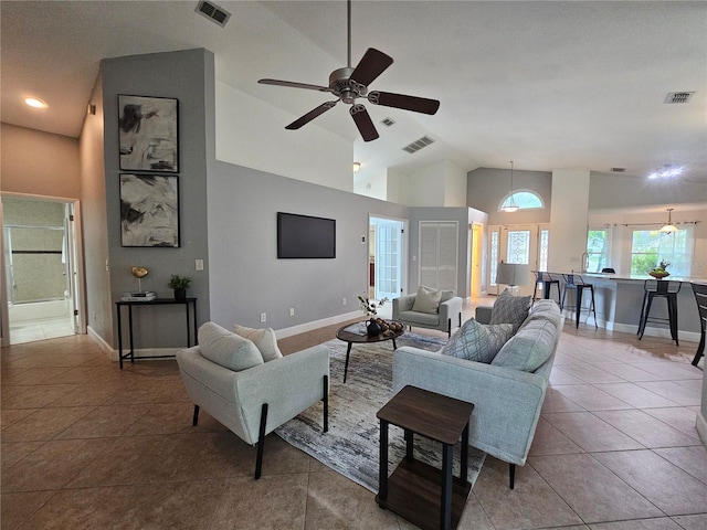 1022 Bartlett Ct, Oviedo, FL 32765 - living room with a ceiling fan, tile patterned floors, and high vaulted ceiling