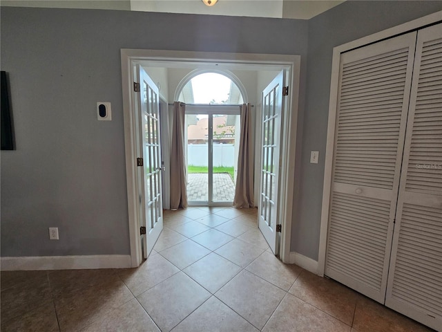 1022 Bartlett Ct, Oviedo, FL 32765 - foyer entrance with baseboards and light tile patterned floors
