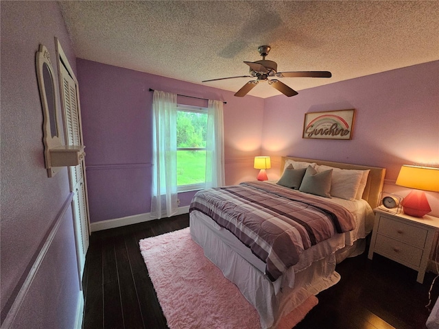 1022 Bartlett Ct, Oviedo, FL 32765 - bedroom with wood finished floors, a textured ceiling, and ceiling fan