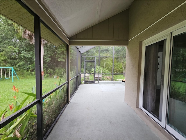 1022 Bartlett Ct, Oviedo, FL 32765 - unfurnished sunroom featuring vaulted ceiling