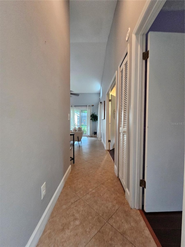 1022 Bartlett Ct, Oviedo, FL 32765 - corridor featuring tile patterned flooring and baseboards