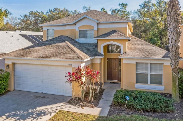 view of property featuring a garage