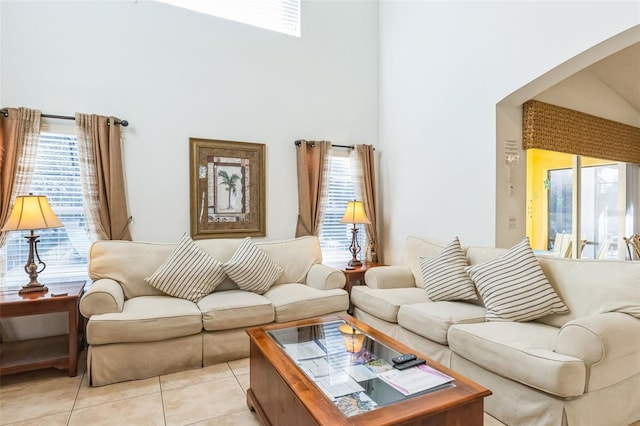 living room with light tile patterned flooring